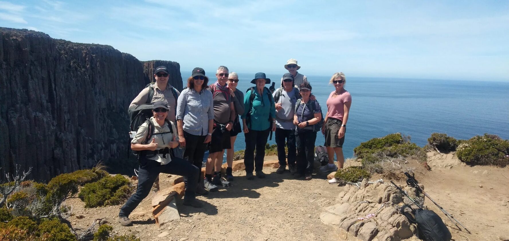 Group on a cliff in Tasmania