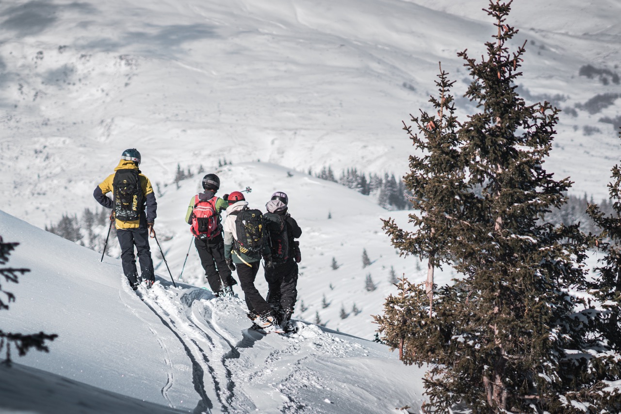 Skiers overlooking a valley in Macedonia