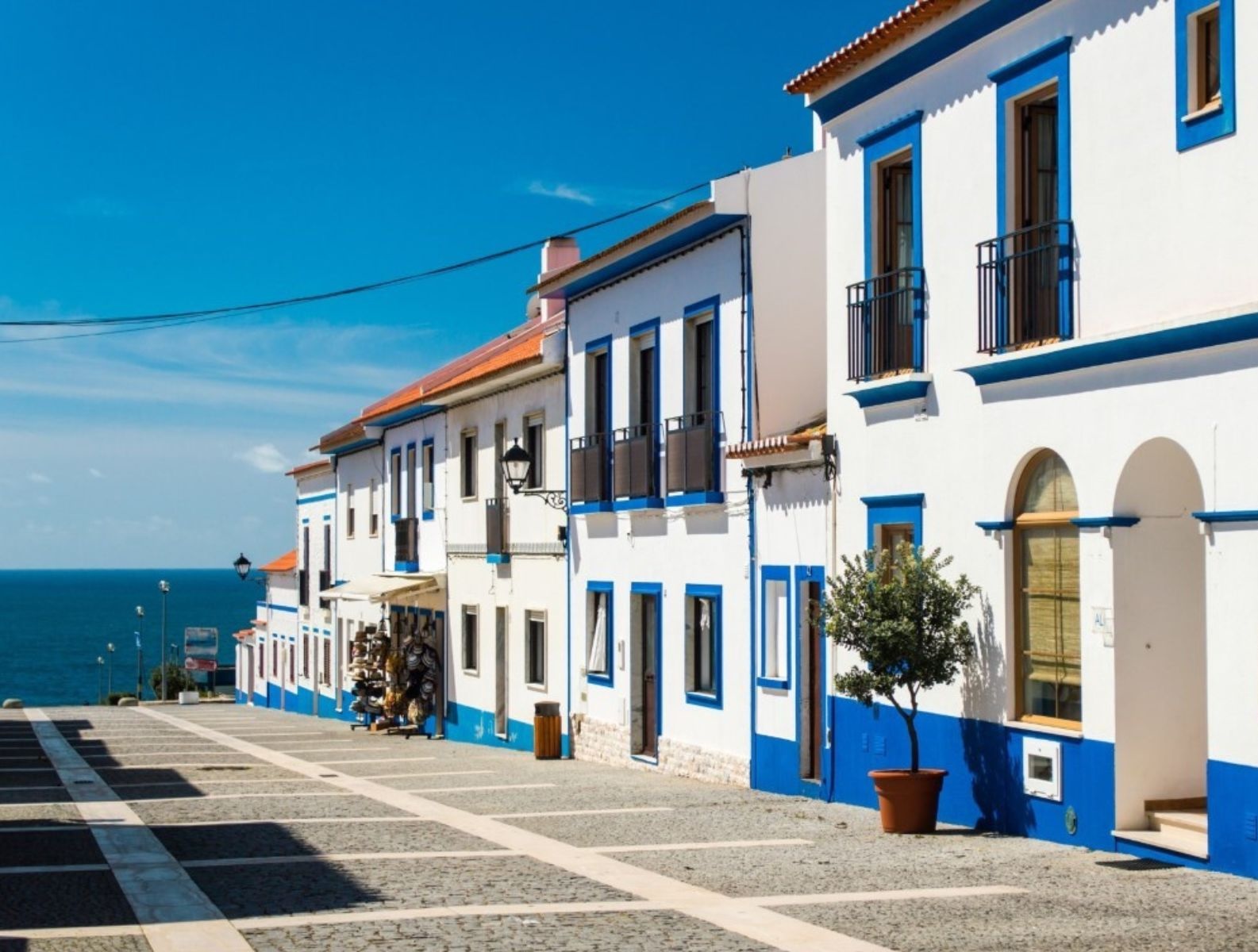 White and blue houses in the village of Porto Covo