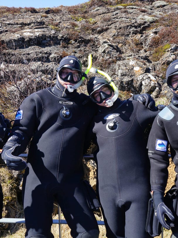 four people snorkeling silfra