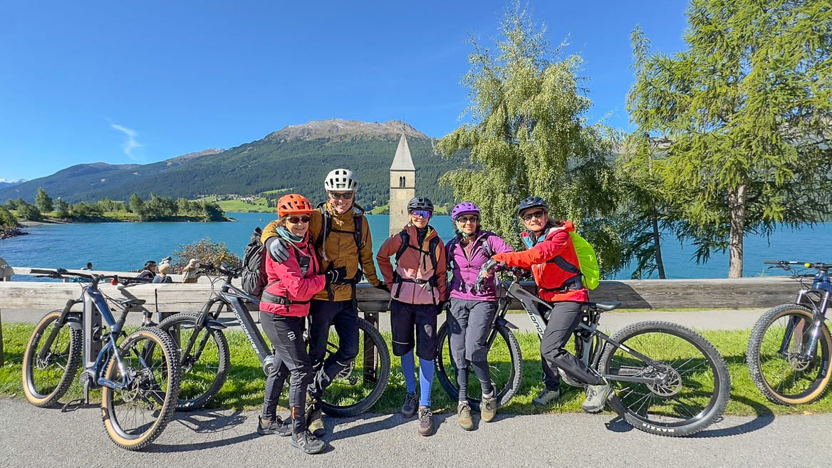 Happy group Alps lake