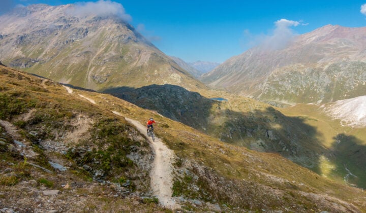 Mountain panorama with a biker