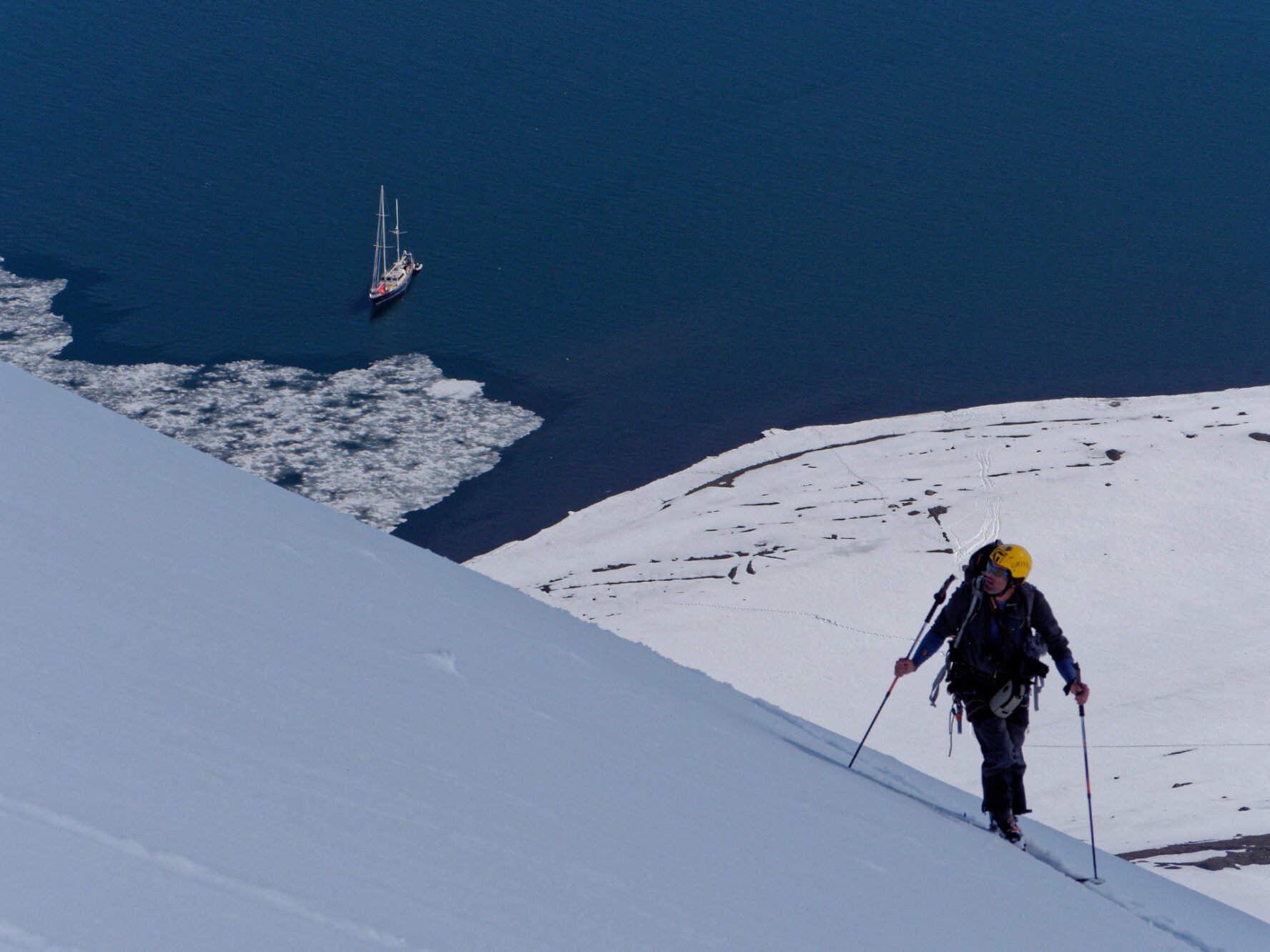 One skier skinning up in Svalbard