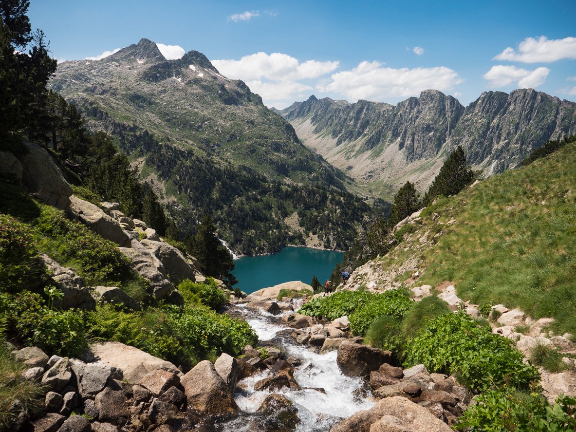 A mountain lake near Restanca surrounded by mountains