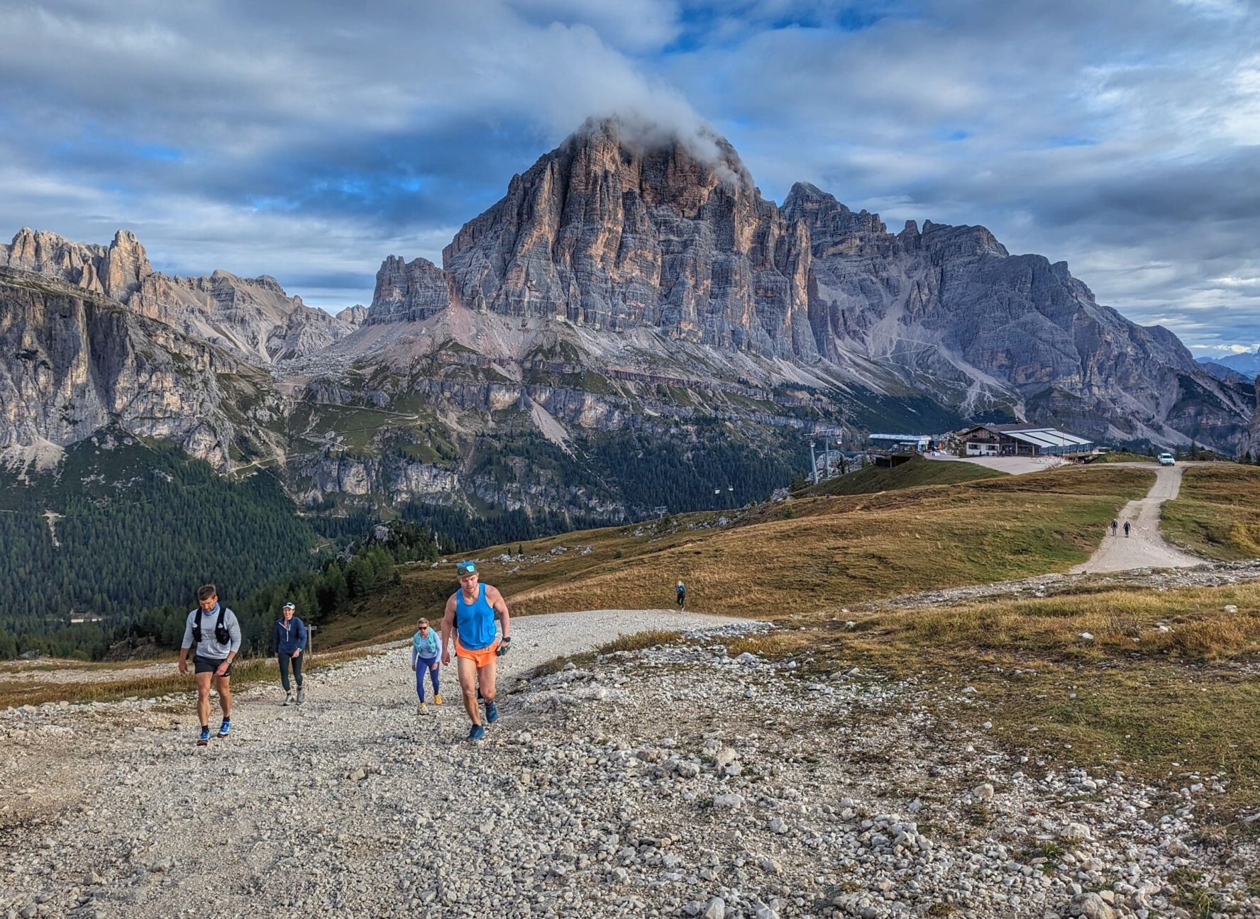 Multiple runners on a trail