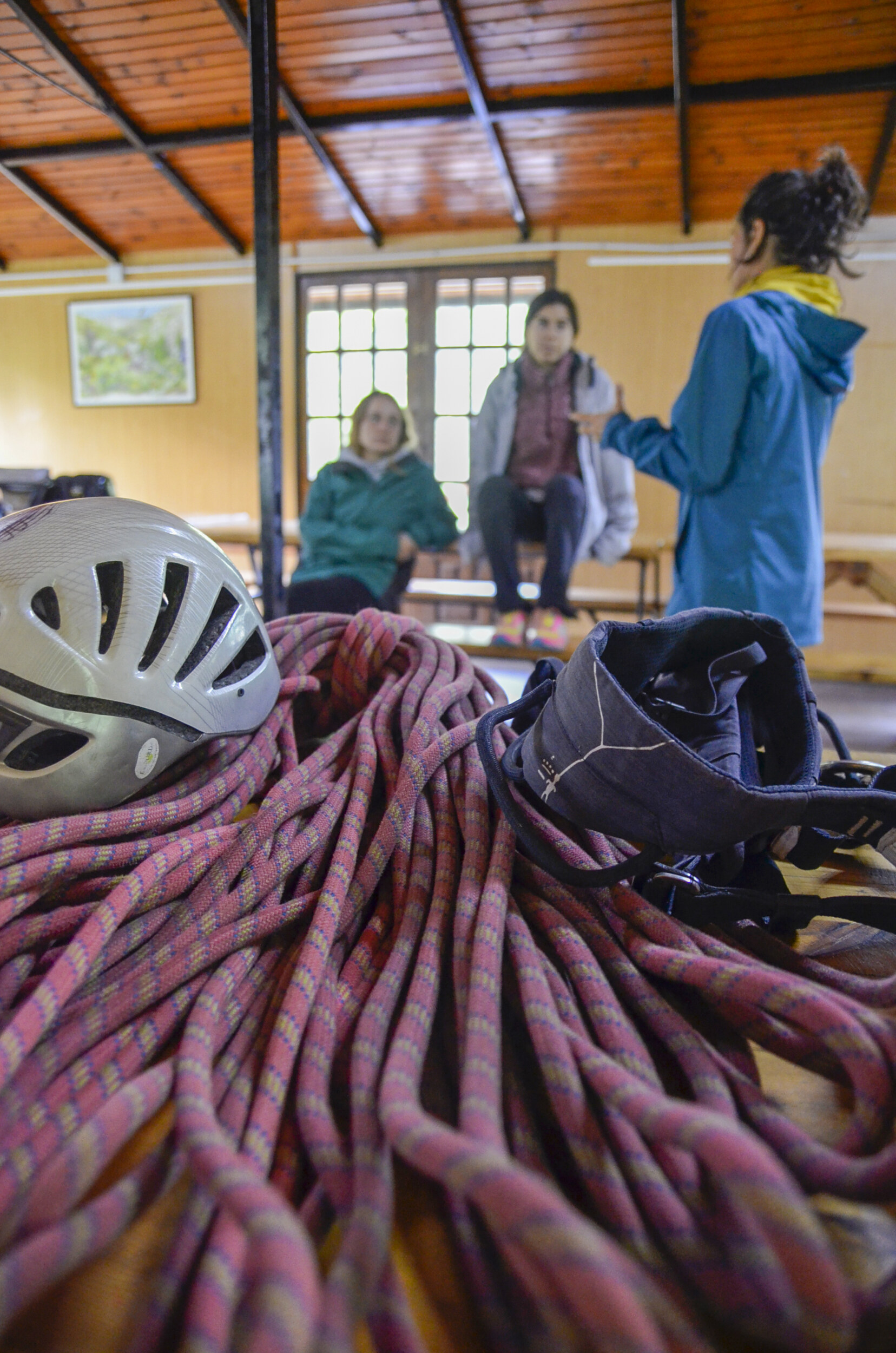 Climbing gear and people in the background