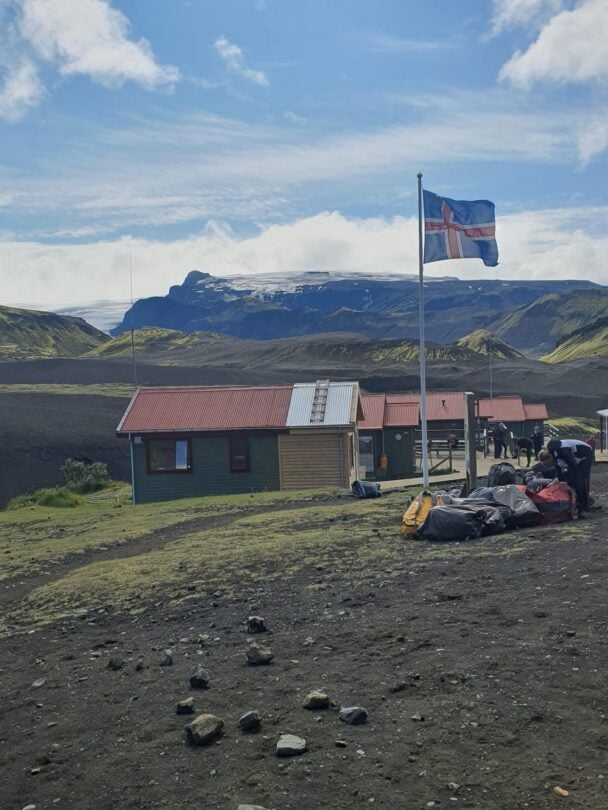 laugavegur hut and a flag