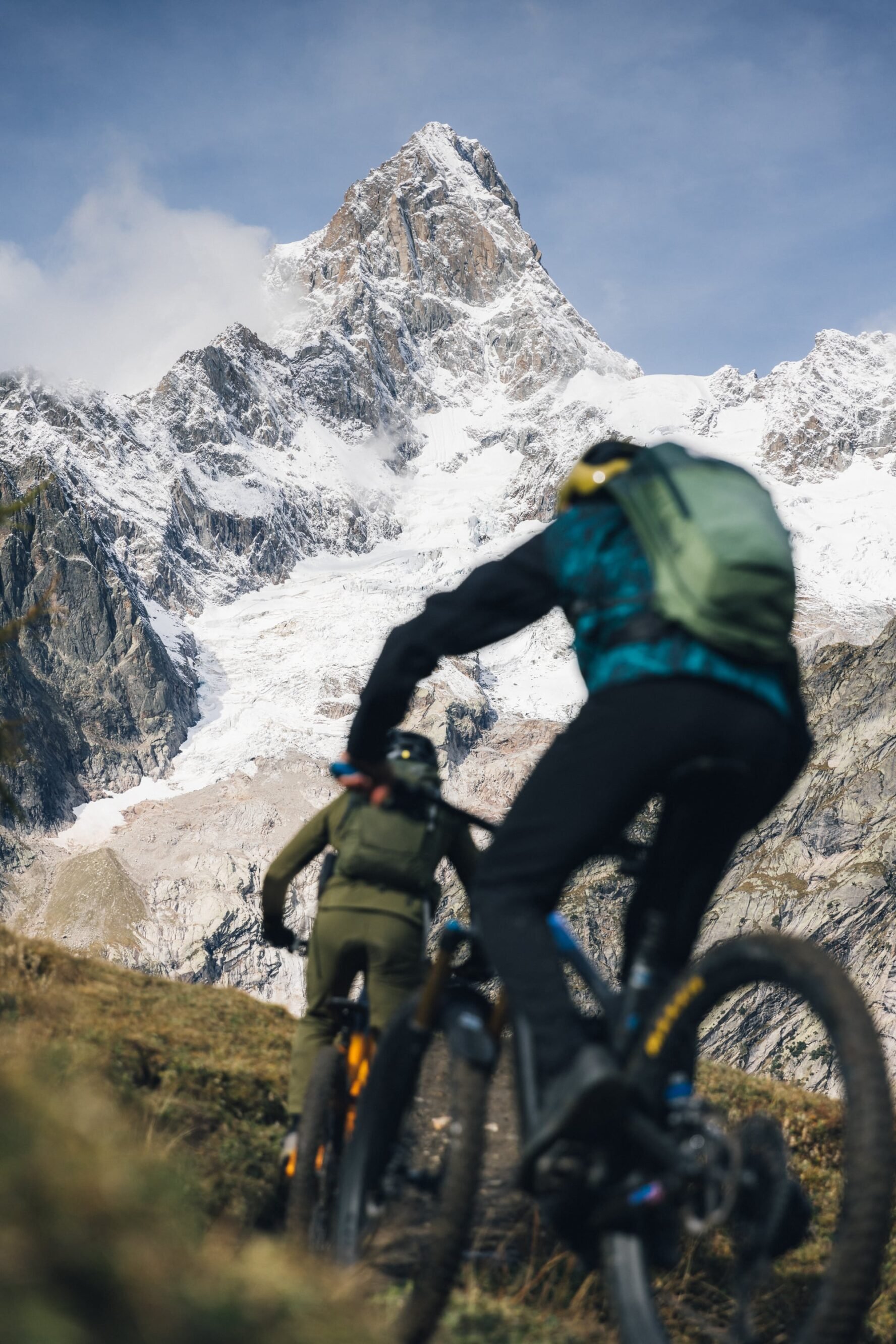 Riders near Matterhorn with a view from behind