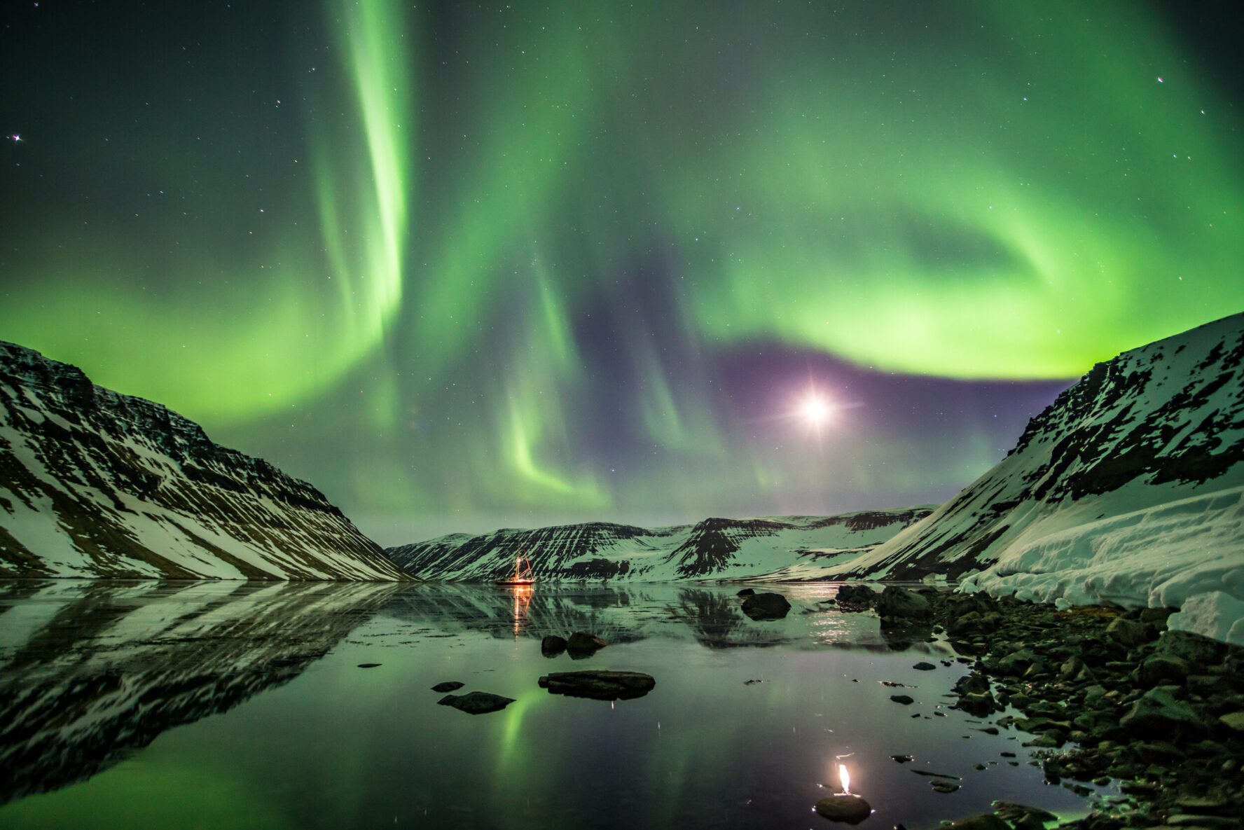 Northern lights and the sailboat in the distance