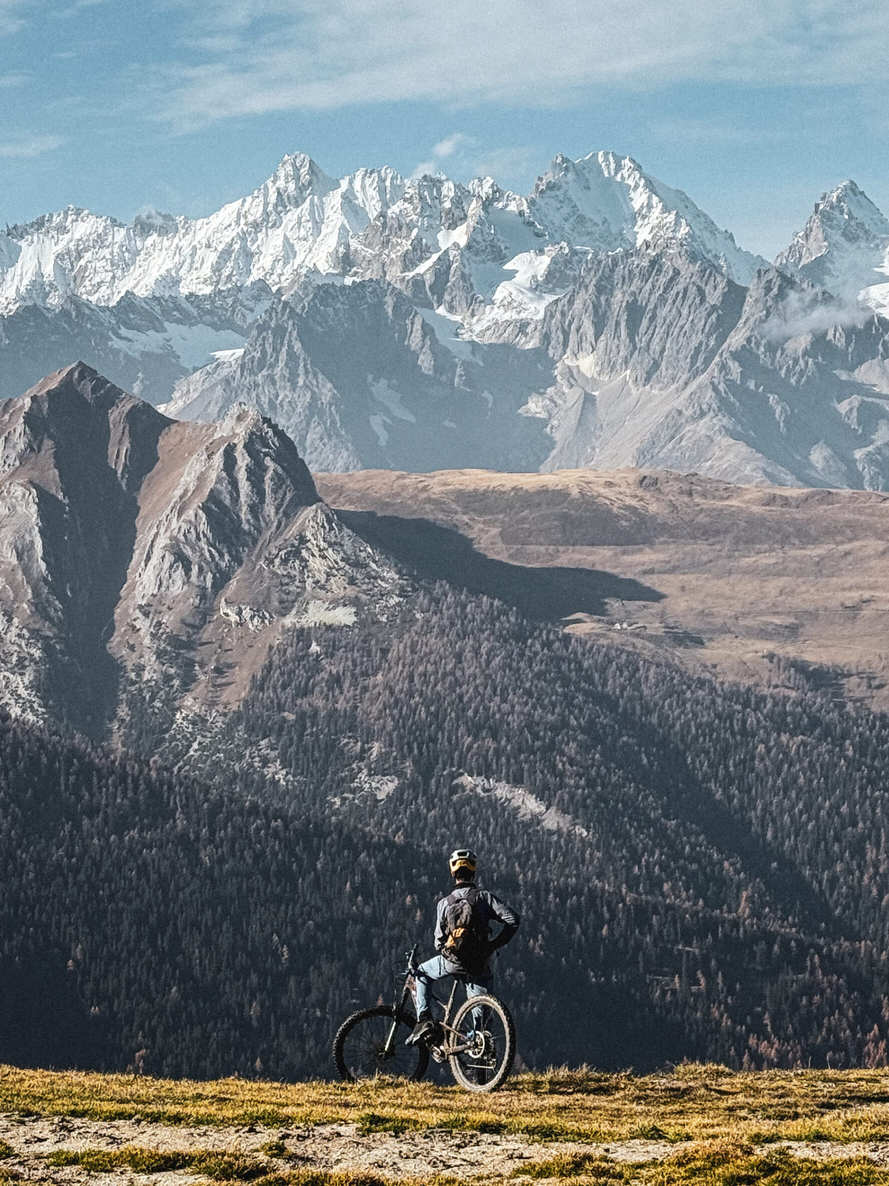 One MTBer looking at the views in the Swiss Alps