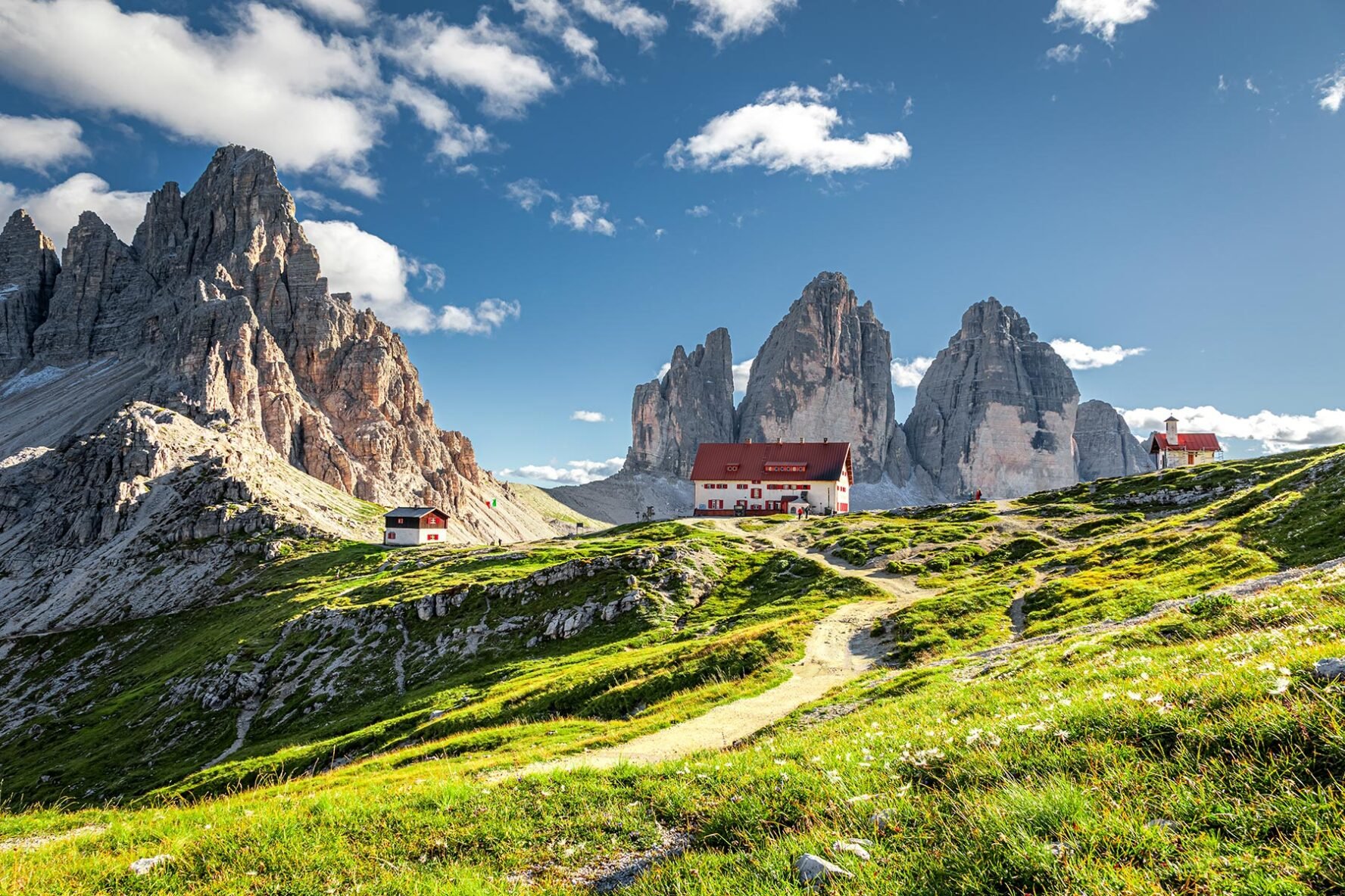 Mountain huts with Tre Cime di Lavaredo in the background