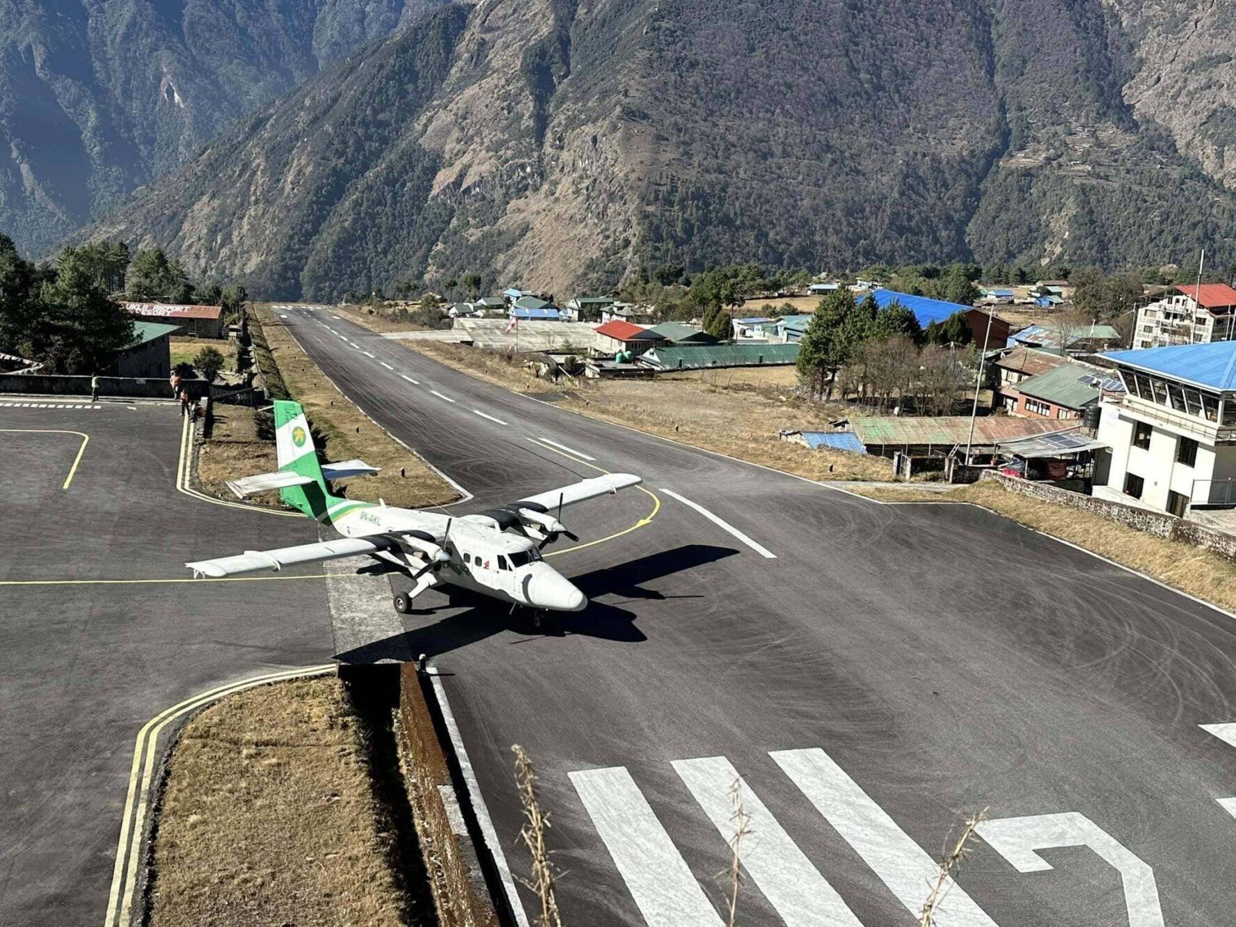 Airplane on the airstrip in Lukla ending the Everest View trek 5 days adventure