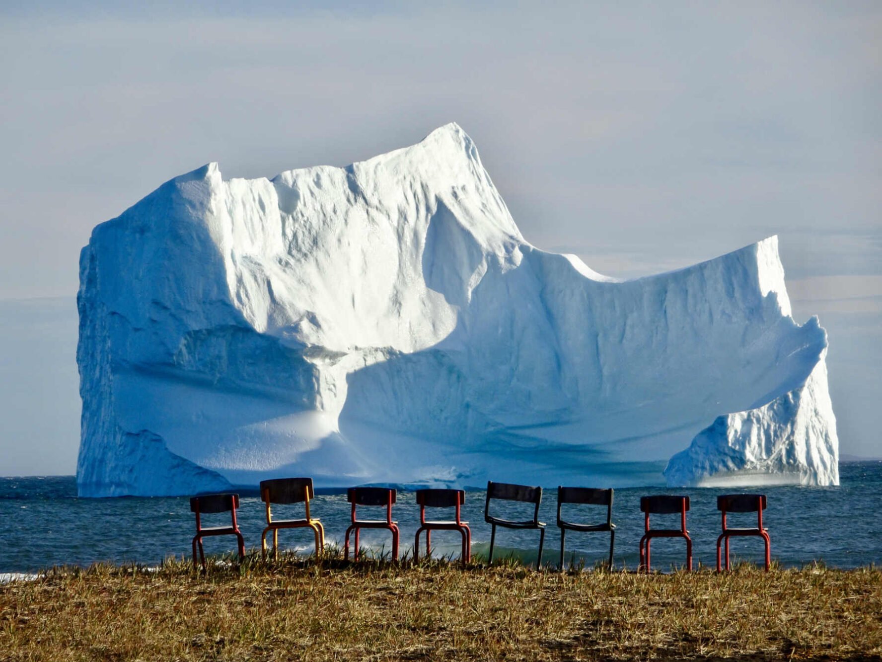 Chairs and Ilulissat Icefjord on the horizon