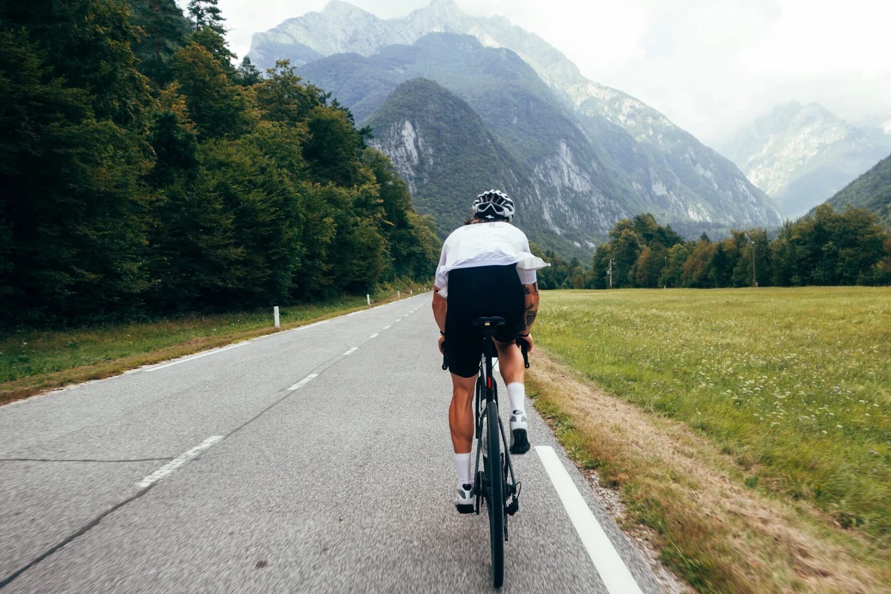 Cyclist in Alps, Slovenia road