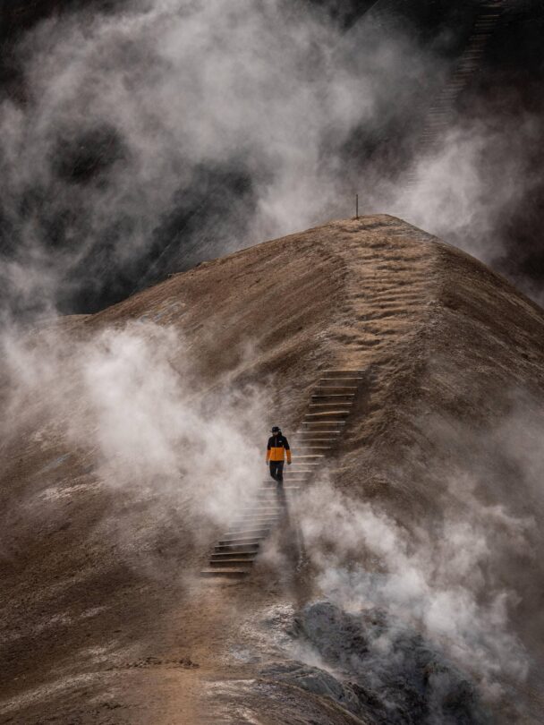 Hiker watching hot springs