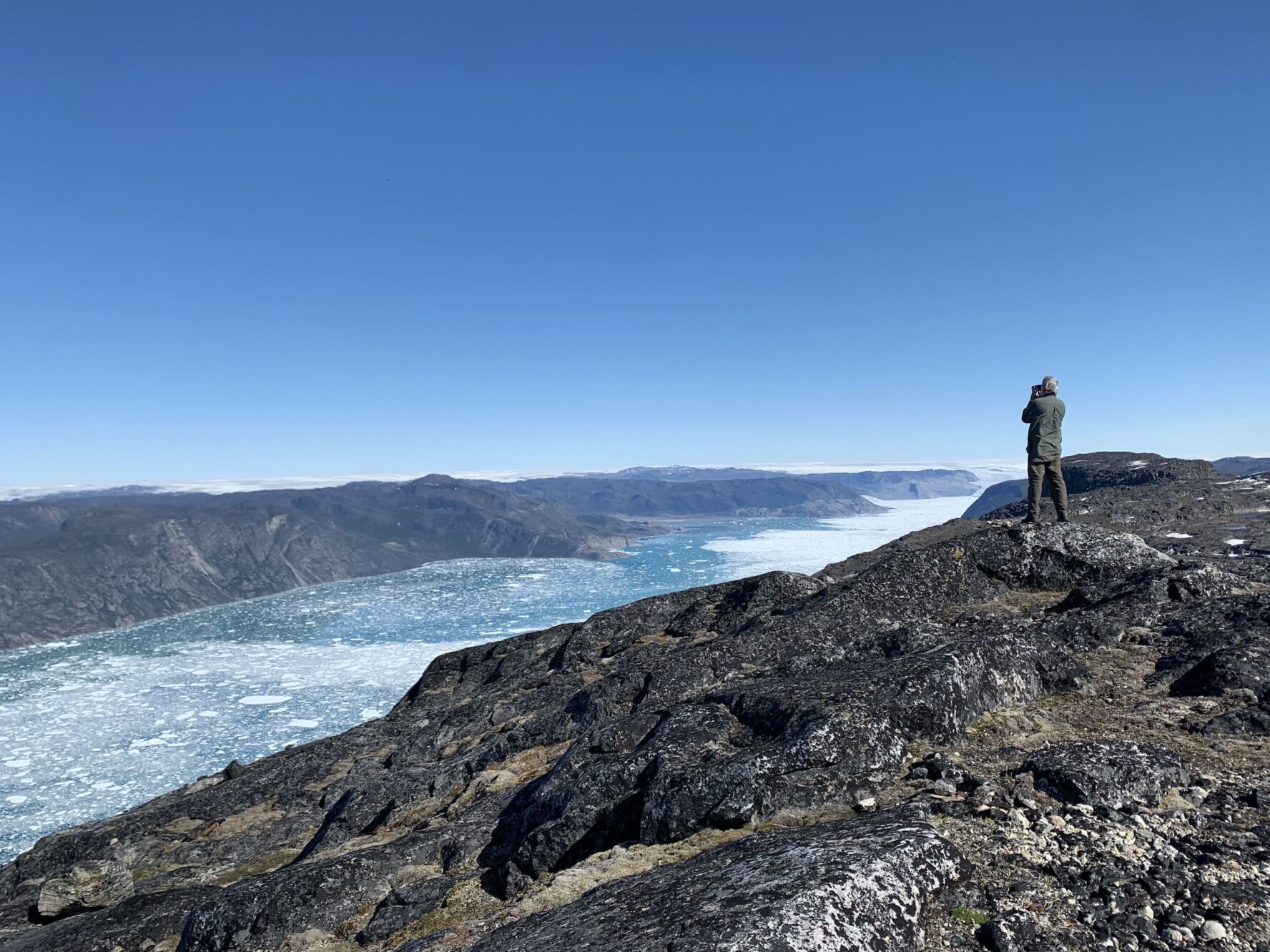 Hiker on top of icefjord
