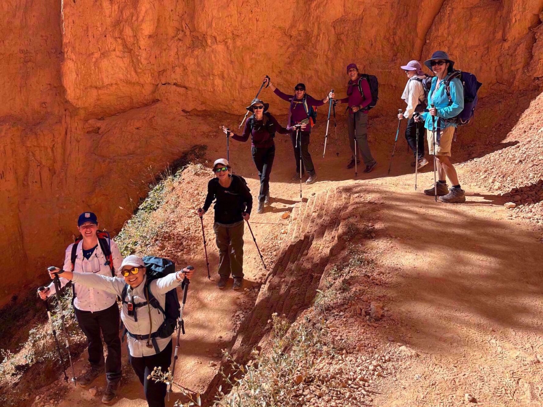 Hikers descending a trail on the Zion and Bryce hiking tour
