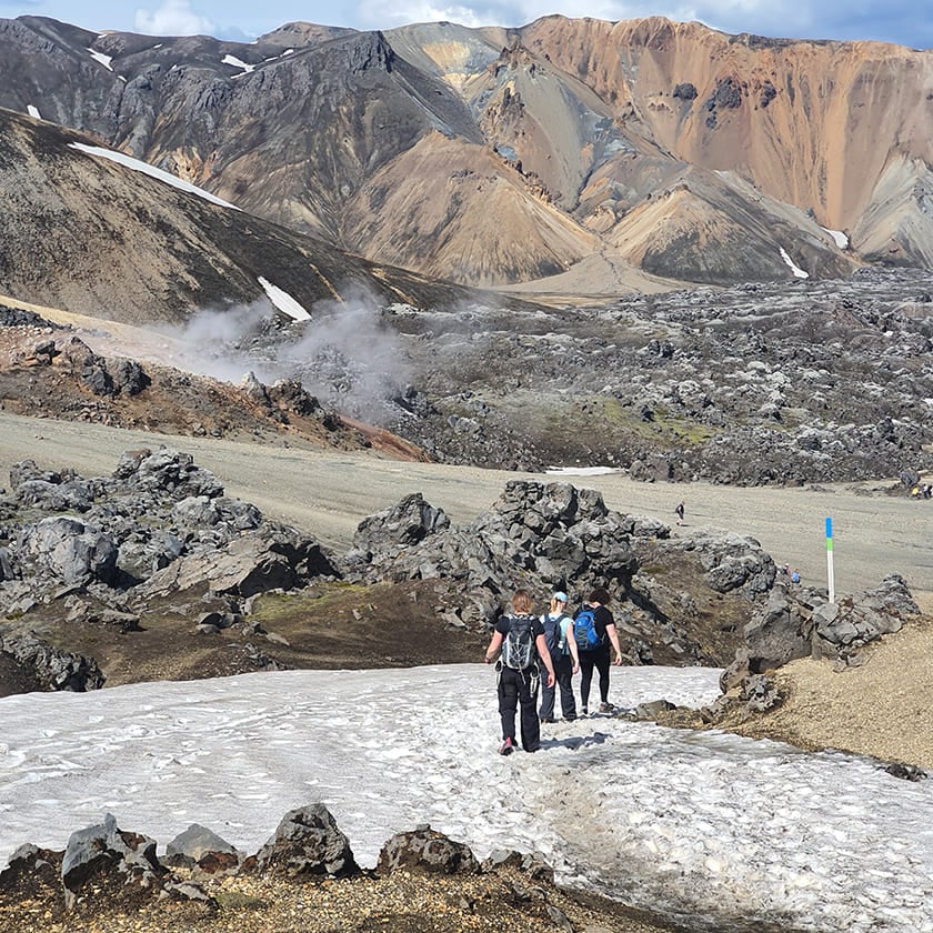 Hikers going downhill