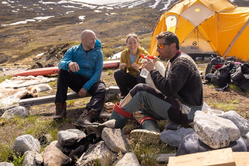 Hikers hanging out in a camp in Greenland