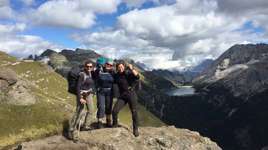 Hikers posing in the Dolomites