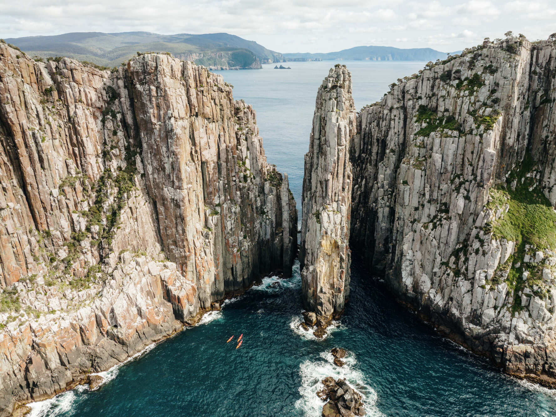 Kayakers in front of the Candlestick, Tasmania