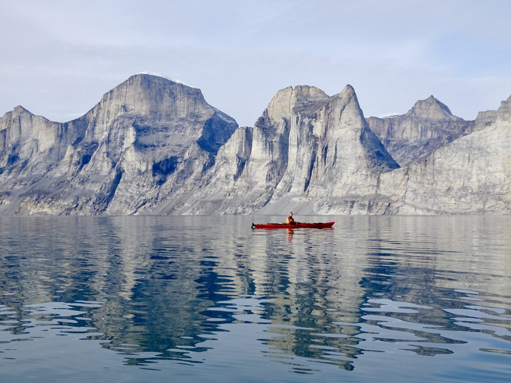 Kayaking near the rugged landscape of Baffin Island