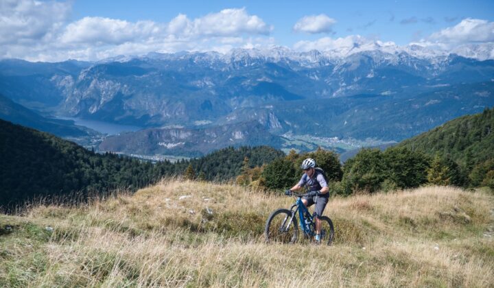 Man on an e-MTB Julian Alps surrounded by mountain scenery