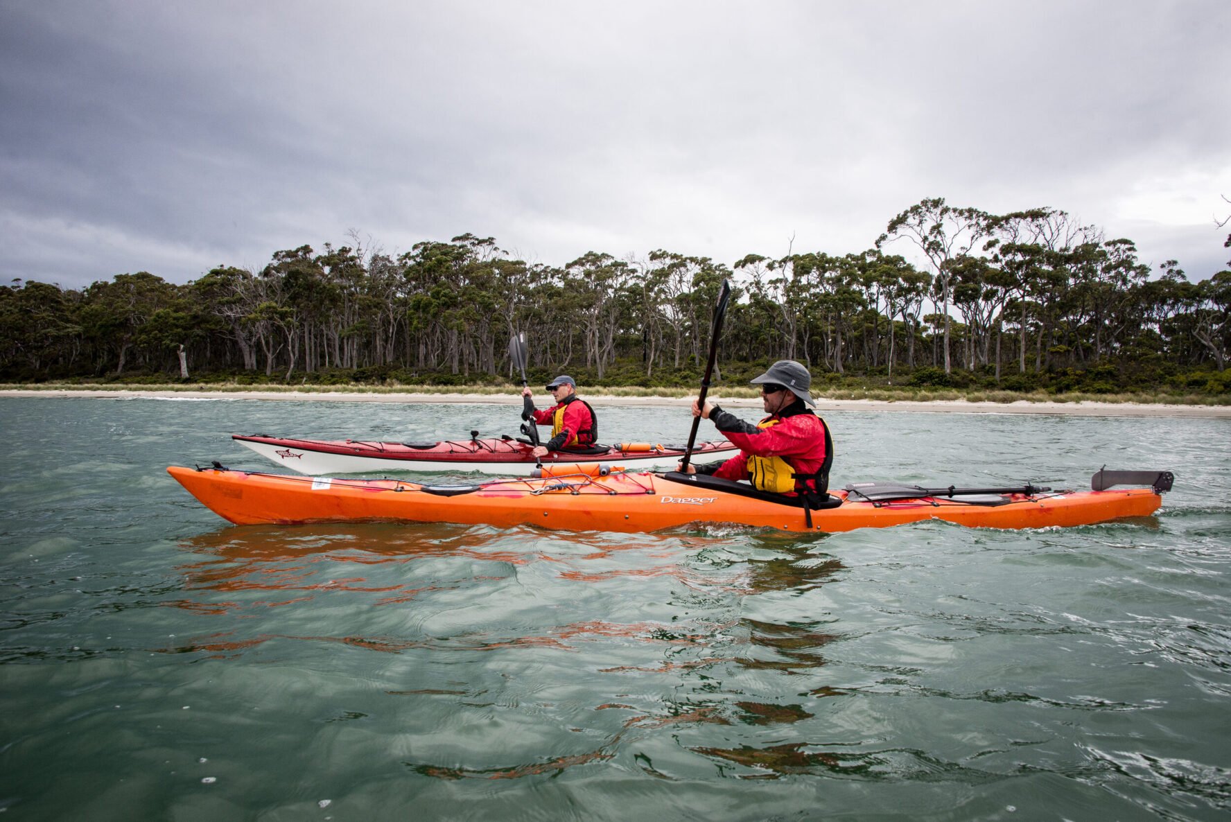 Group kayaking with Bruny Island in the background