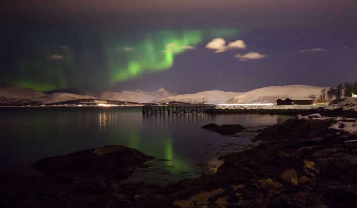 Serene lake under Northern lights