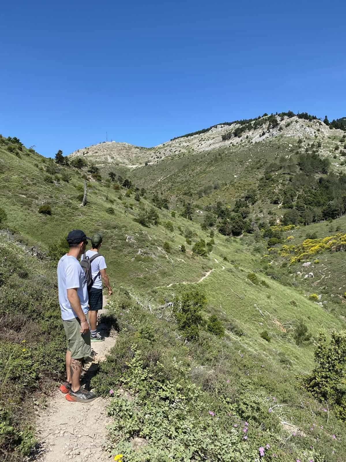 Two hikers hiking on Mount Parnitha