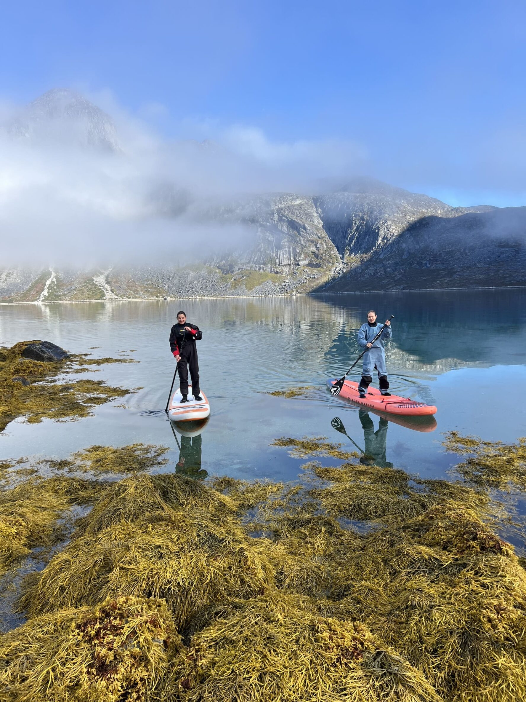 Two hikers paddling Greenland
