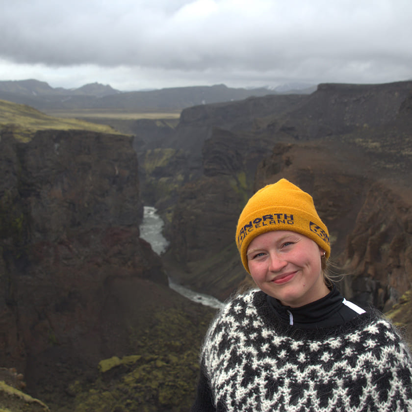 Woman with a canyon in Iceland in the background