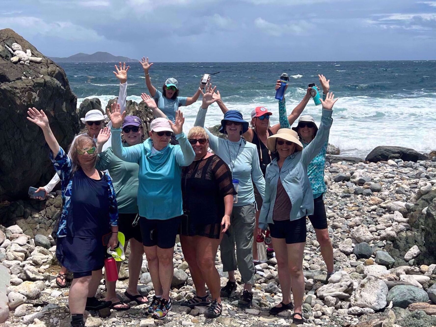 Group posing in Drunk Bay, Virgin Islands on the Caribbean adventure