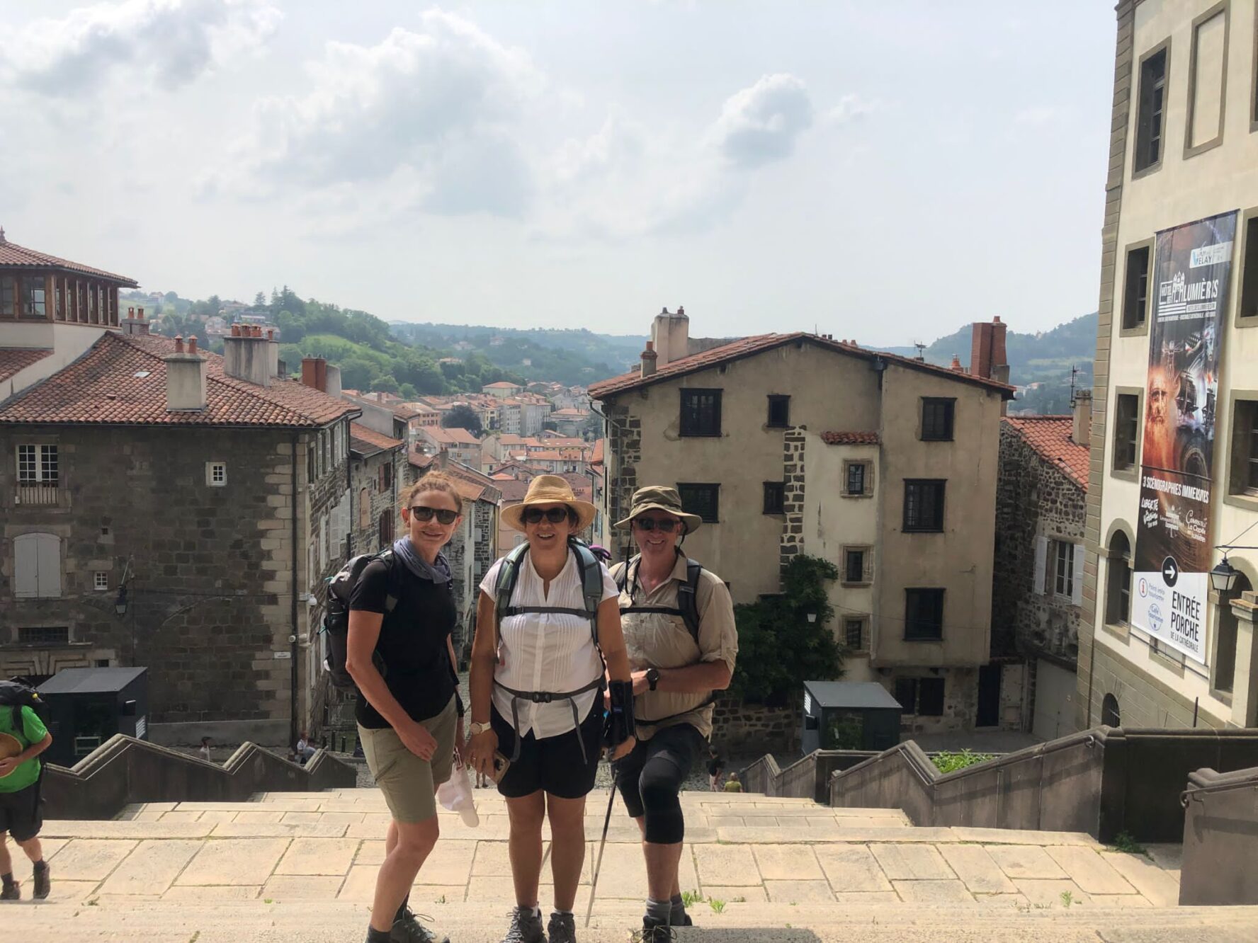 Three hikers in Le Puy en Velay, France