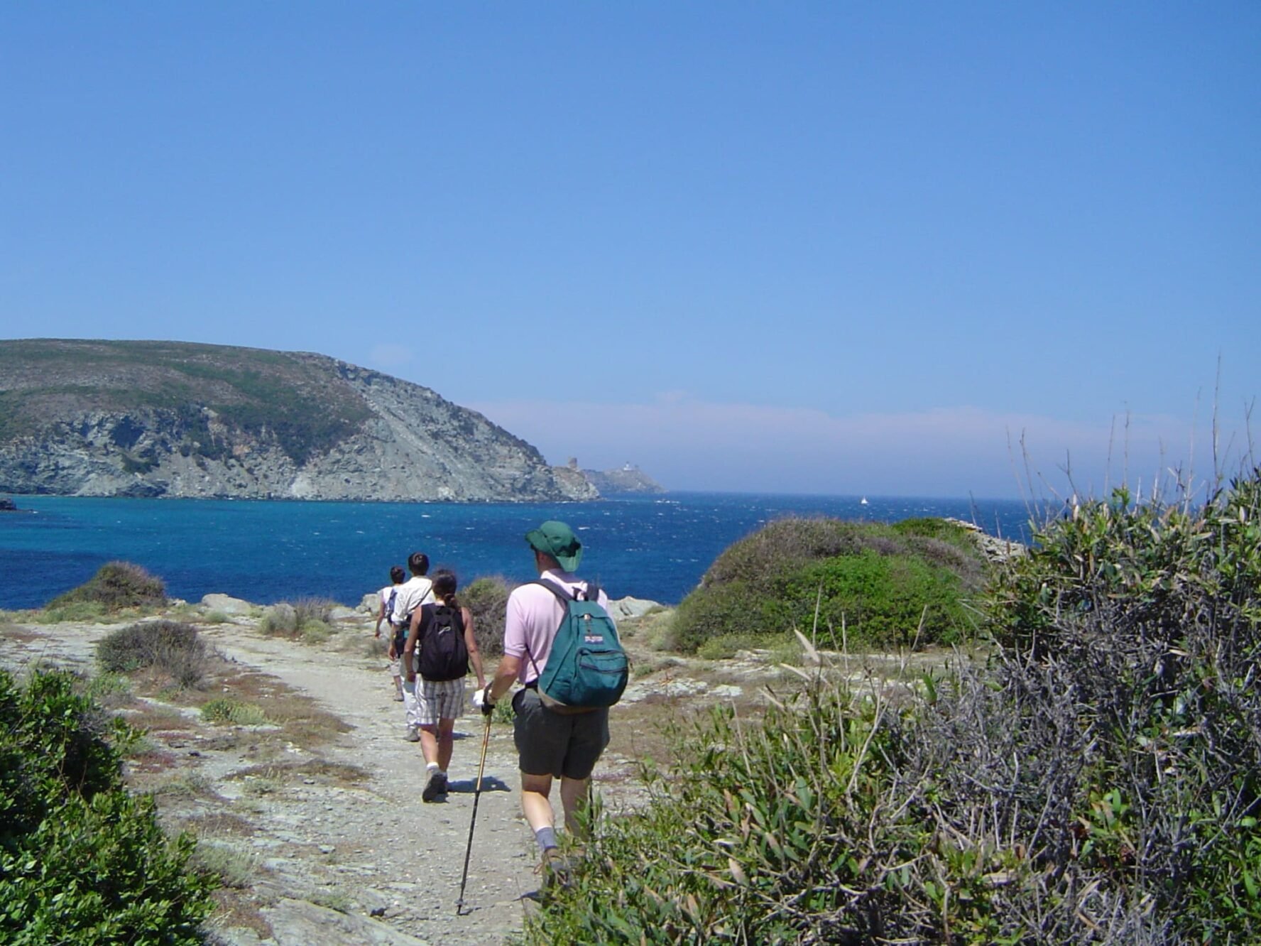 Hikers near the sea in Corsica