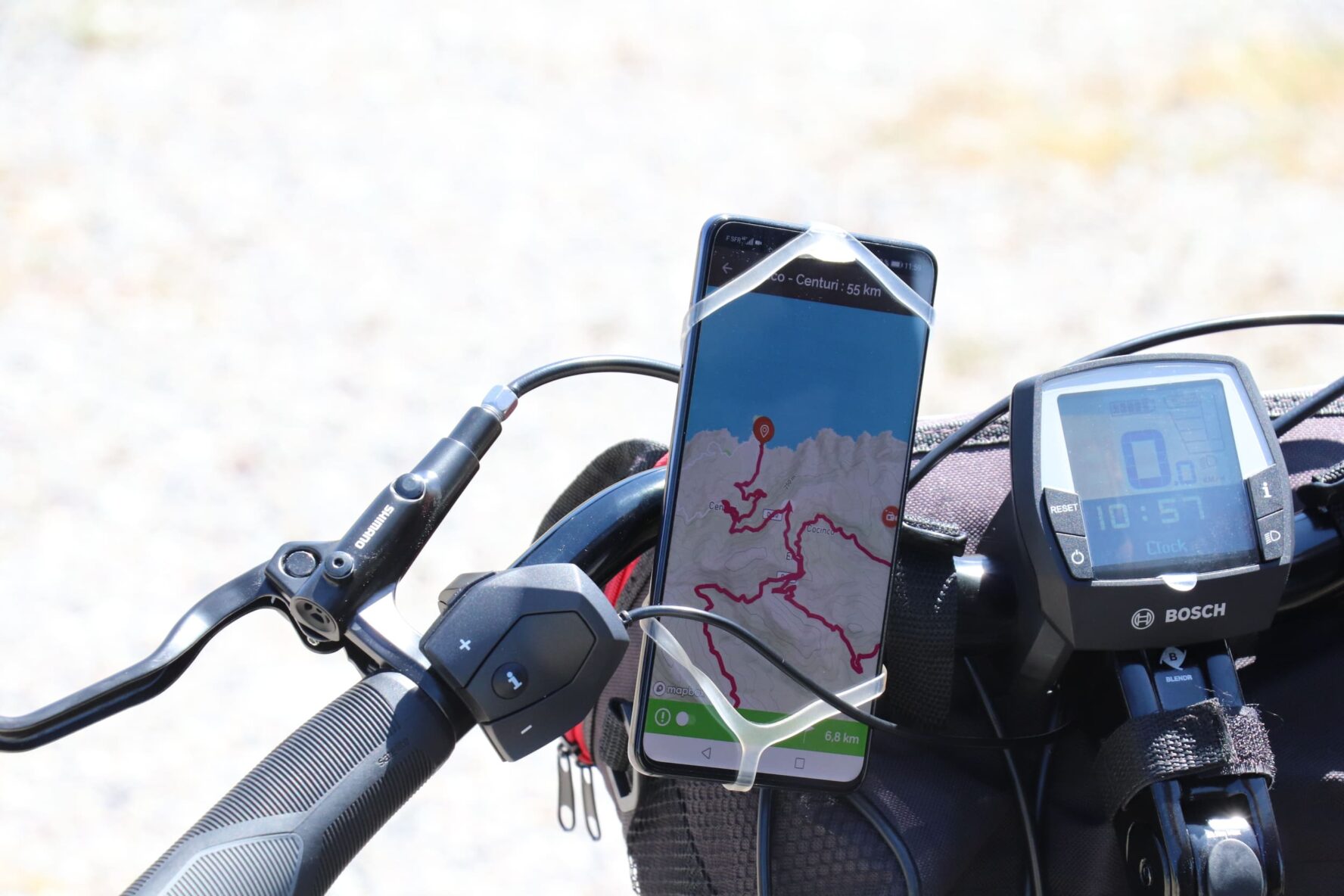 Phone on the bike with North Corsica bike holidays route details