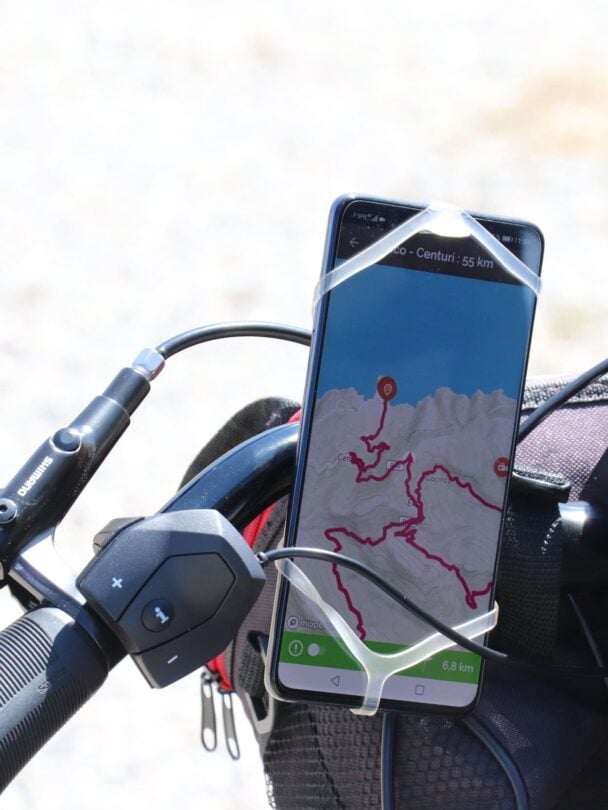 Two riders enjoying panoramic views of Centuri on the North Corsica bike holidays