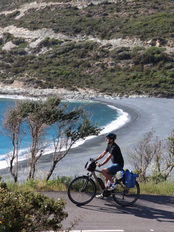Two riders enjoying panoramic views of Centuri on the North Corsica bike holidays
