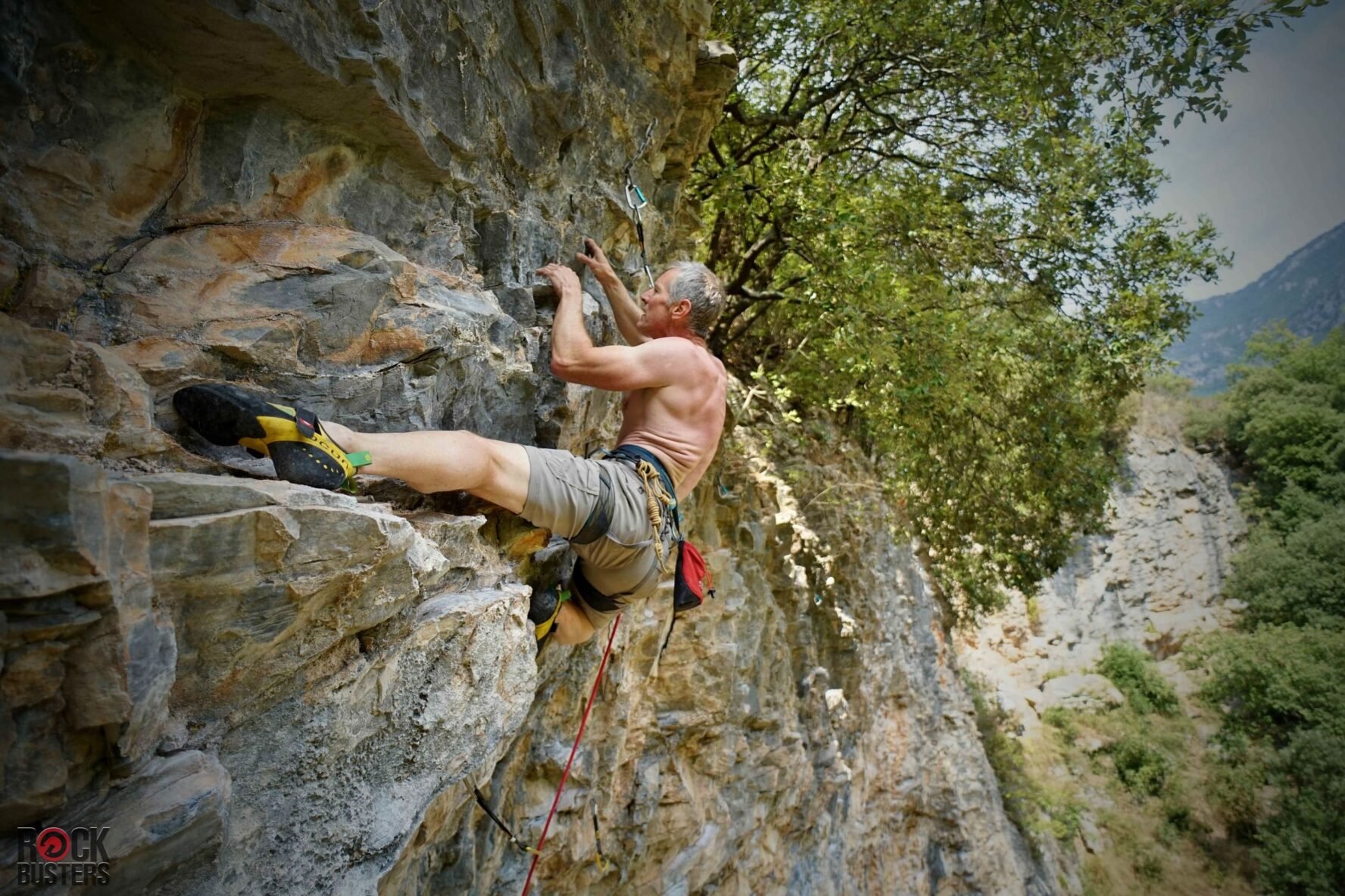 Rock climber on limestone in Finale Ligure