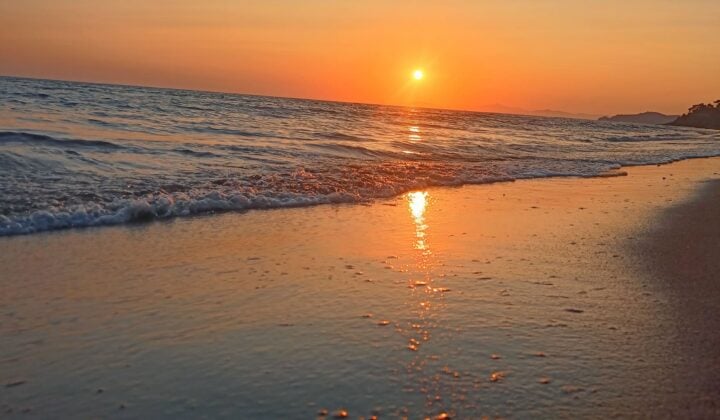 Sandy beach in Tuscany at sunset