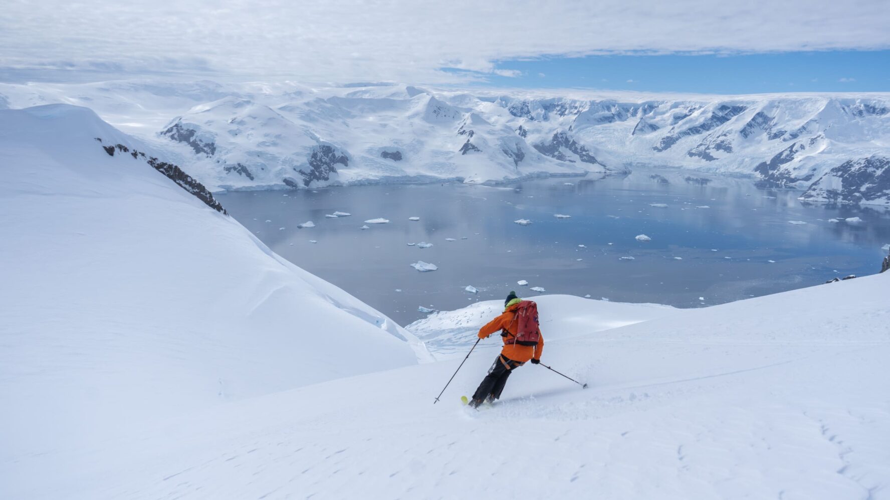 Skier descending a slope on the Antarctica adventure