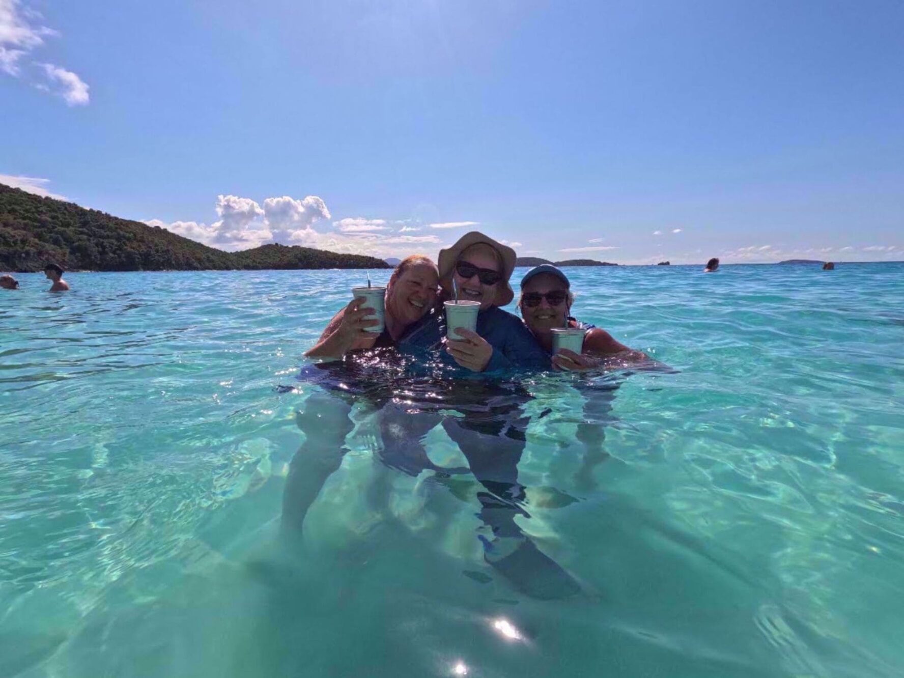 Women snorkeling and smiling on their Caribbean adventure