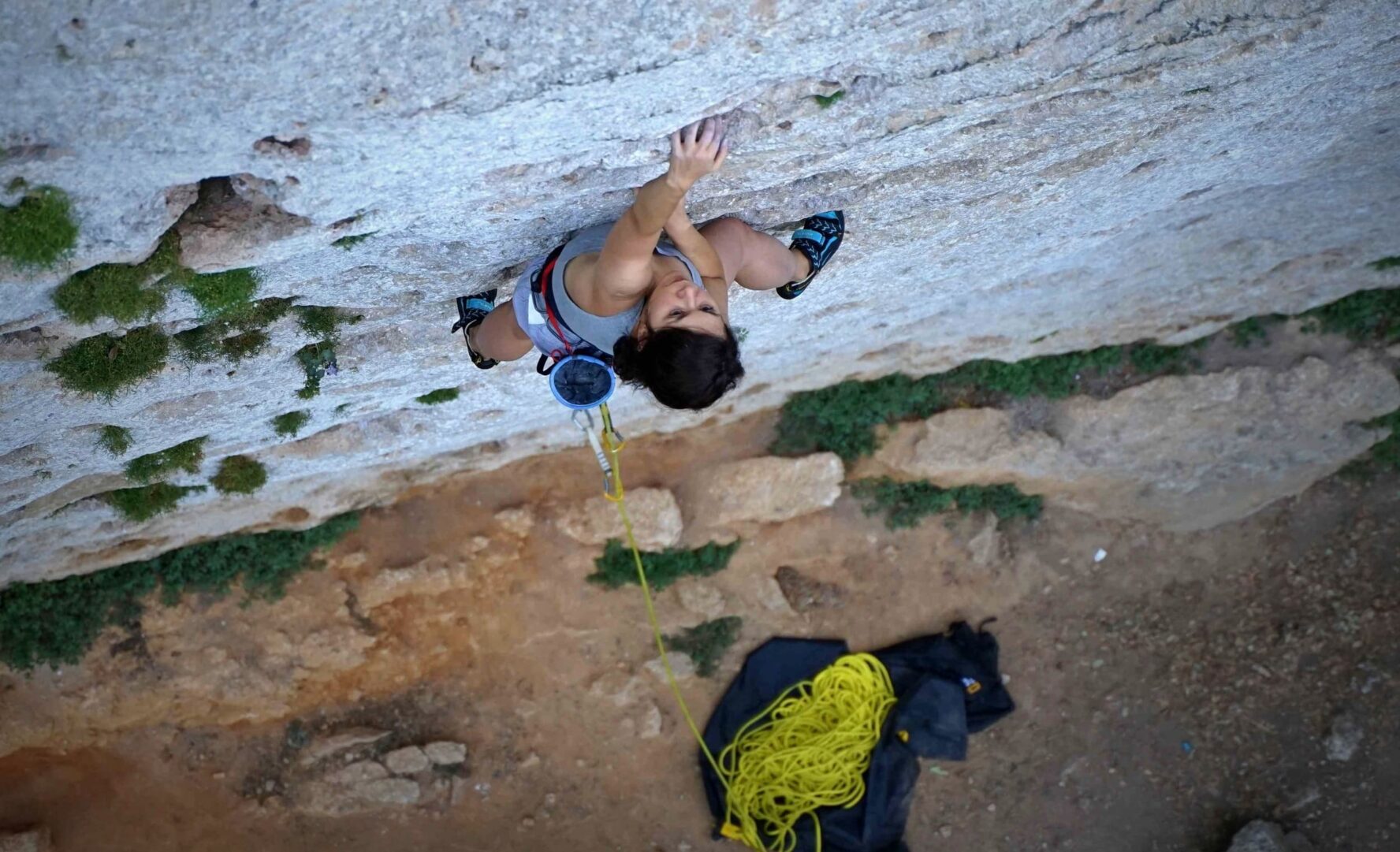 Woman on the rock climbing holiday Europe in Finale Ligure