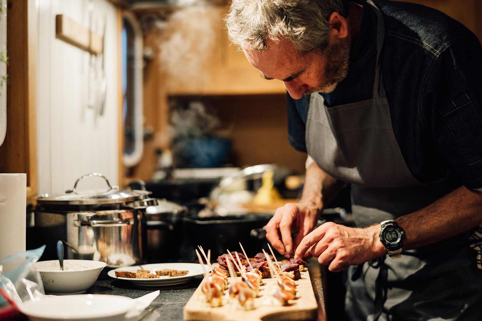 Chef preparing canapes on the HMS Gassten