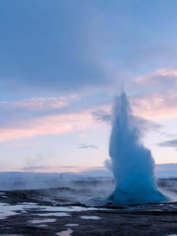Woman under Seljalandsfoss
