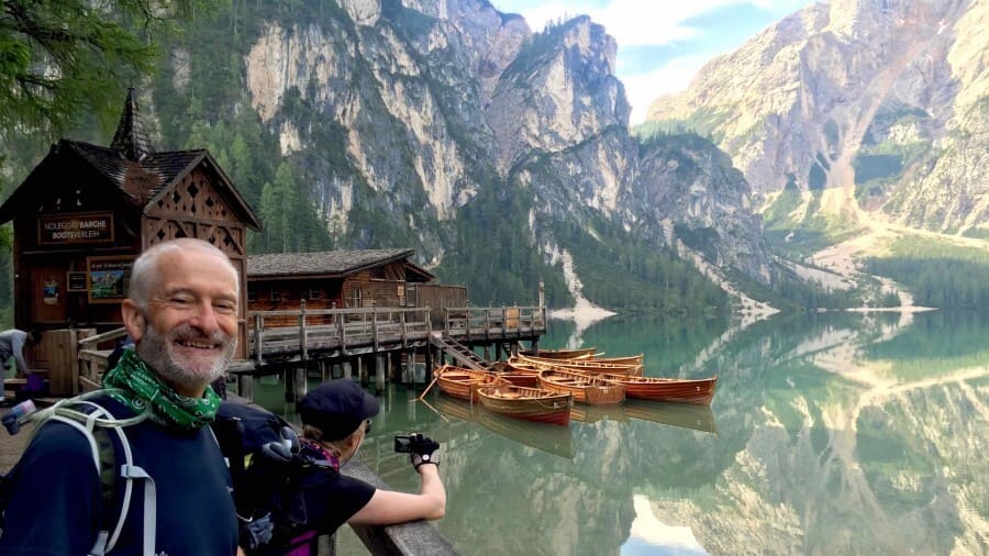 Gorgeous lake in the Dolomites and hiker