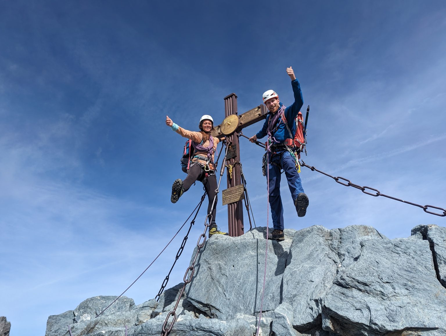 Hikers at the Grossglockner summit in the Austrian Alps