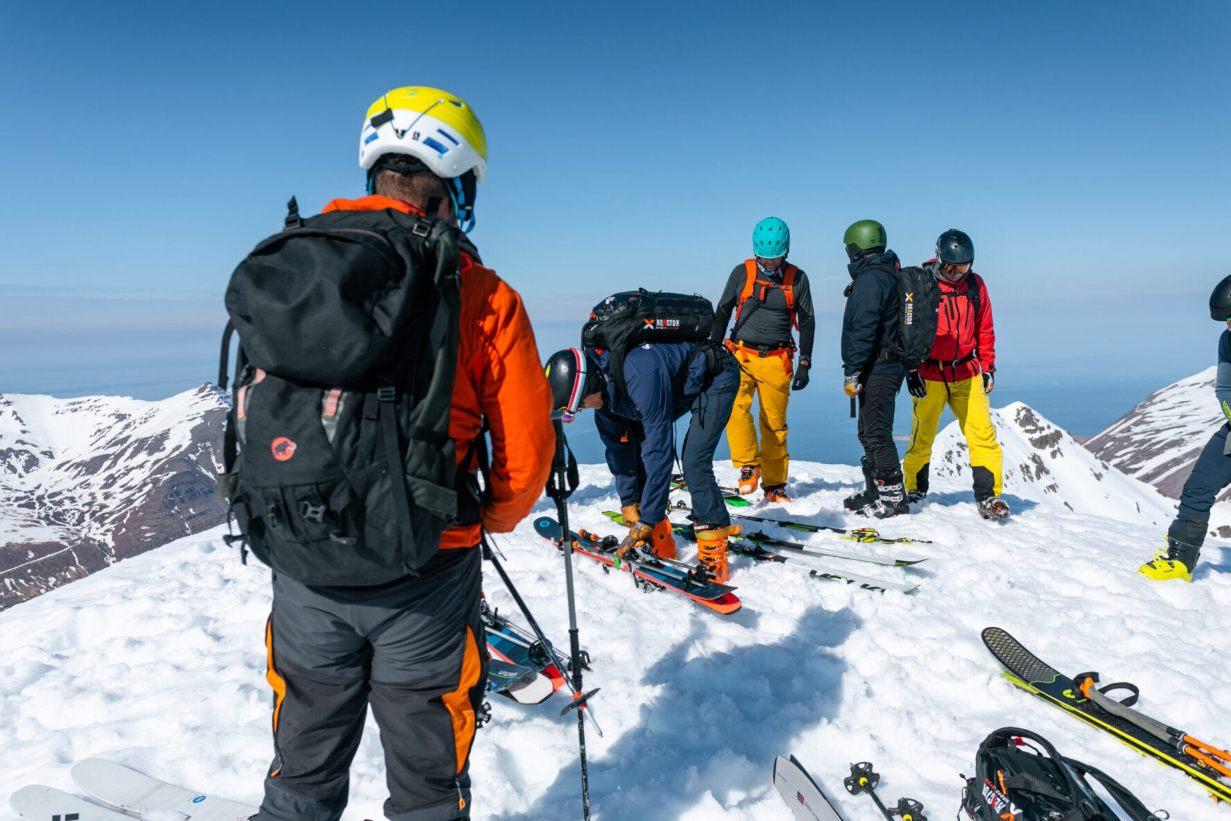 Group preparing to ski on the Iceland heli touring adventure