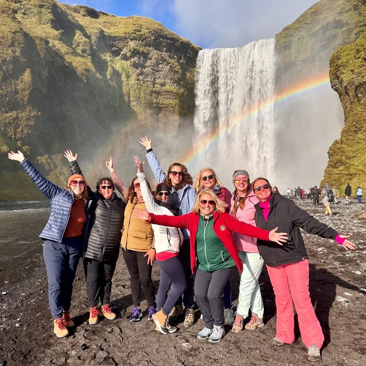 Happy women, Skogafoss waterfall
