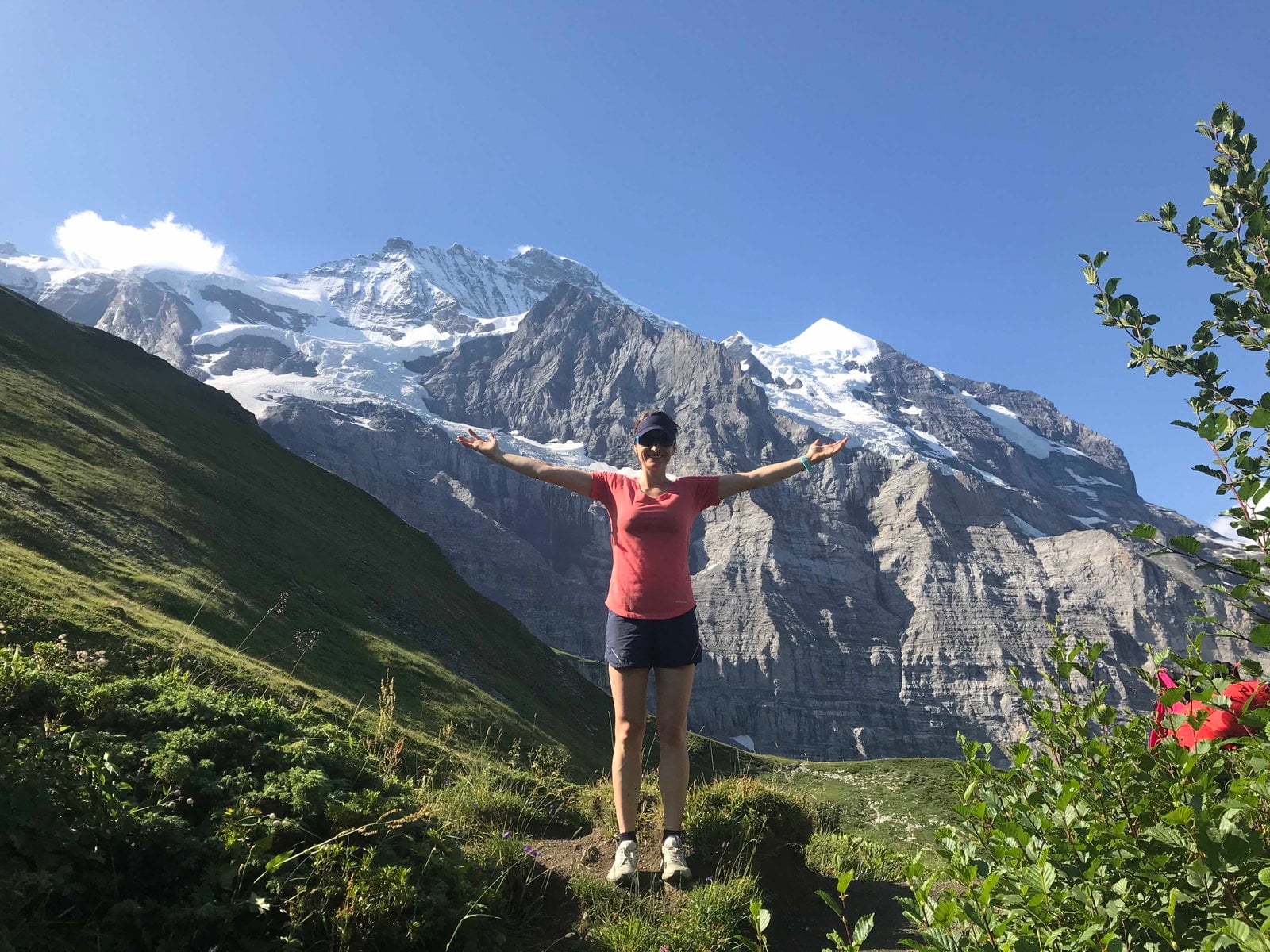 hiker atop dolomites views
